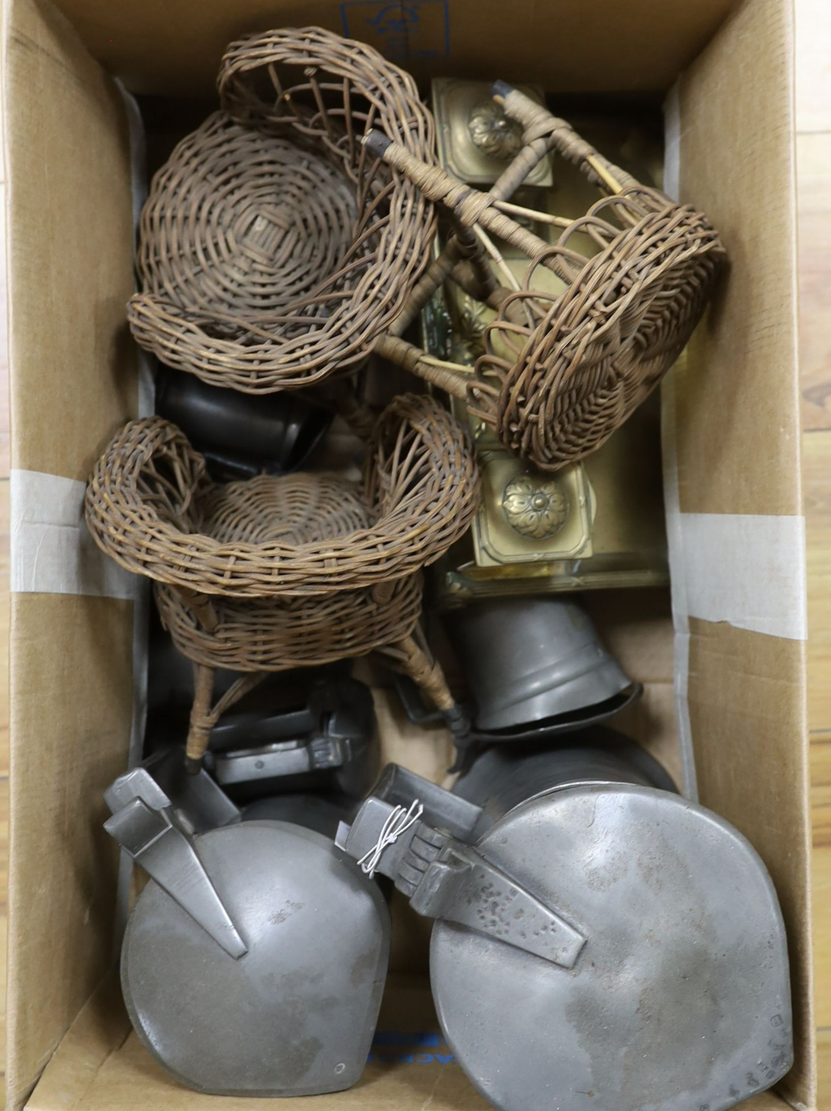 A selection of pewter measures together with an inkstand and miniature wicker furniture (1 box)